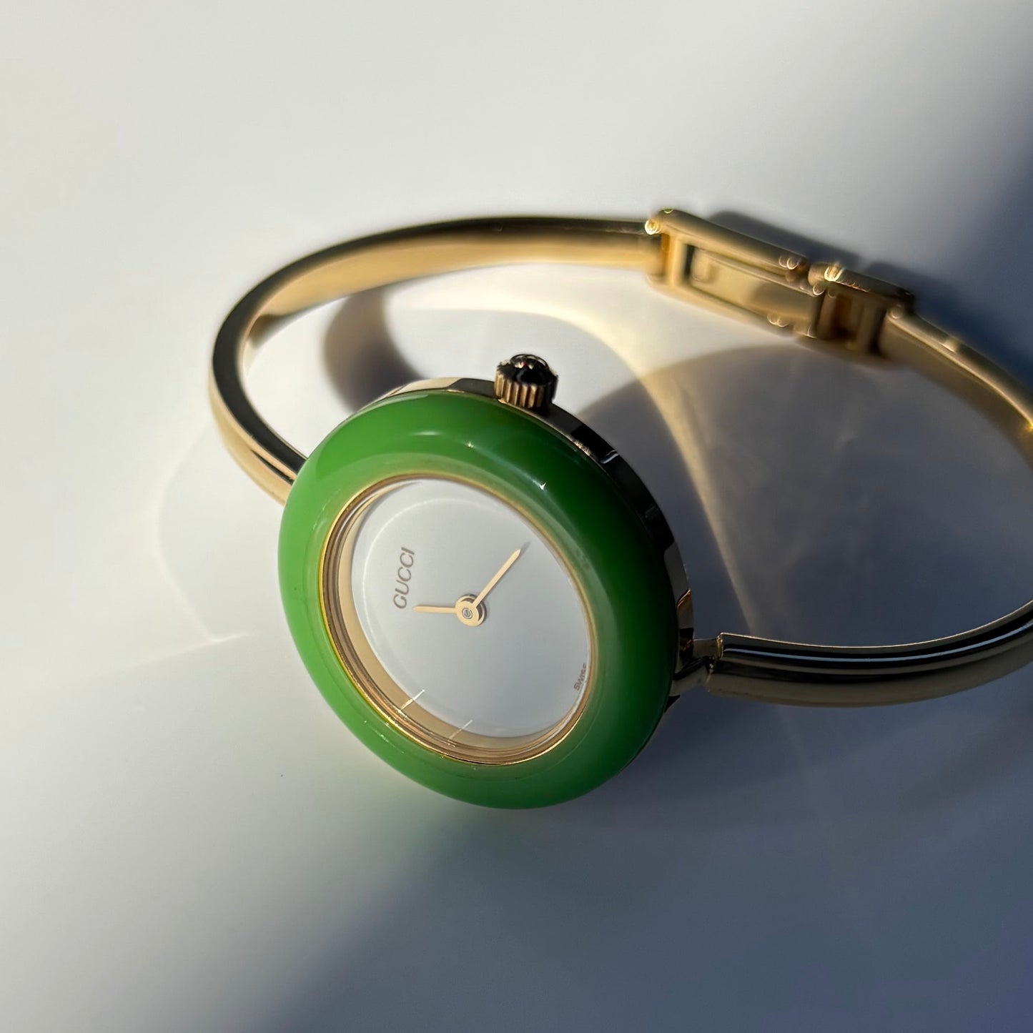 Gucci 1990s Interchangeable Bezel Gold Plated Bangle Watch with 12 bezels, case