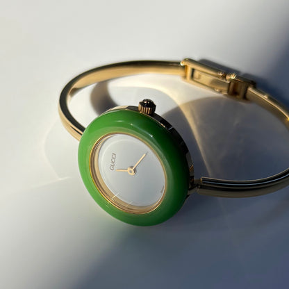Gucci 1990s Interchangeable Bezel Gold Plated Bangle Watch with 12 bezels, case