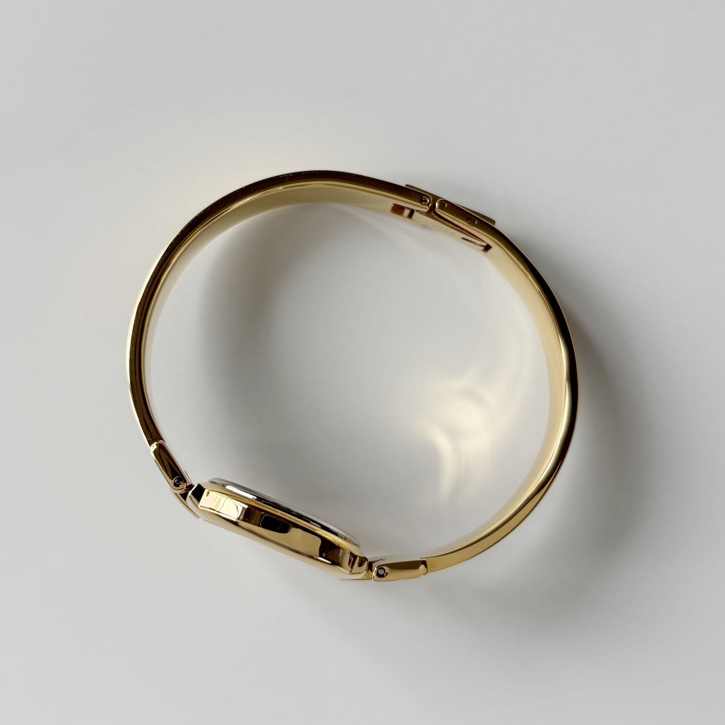 Givenchy 1990s Round Dial Gold Plated Bangle Watch