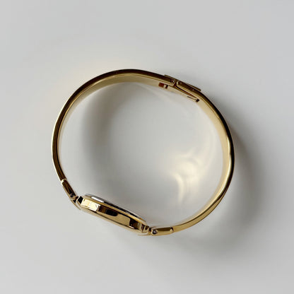Givenchy 1990s Round Dial Gold Plated Bangle Watch