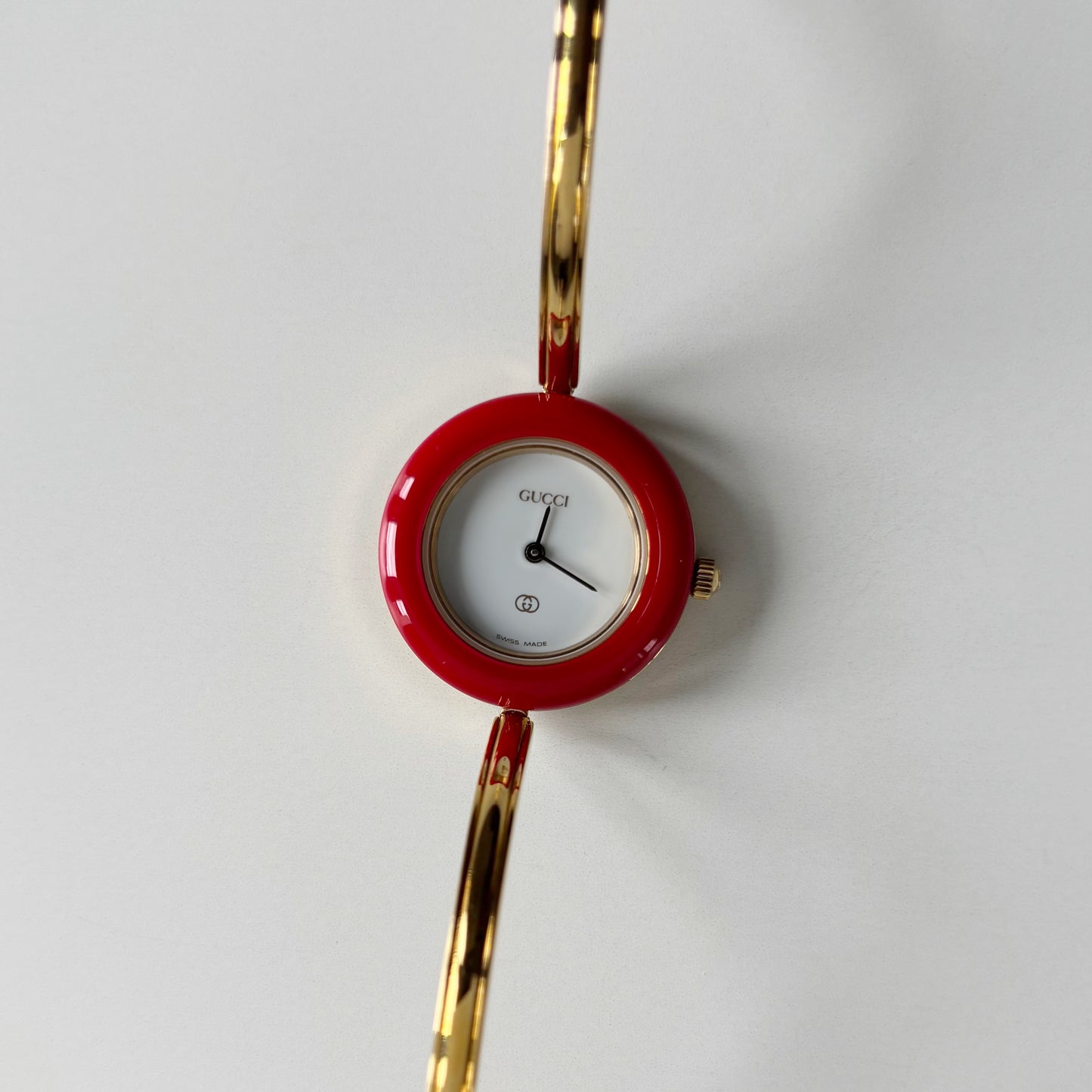 Gucci 1990s Interchangeable Bezel Gold Plated Bangle Watch with 12 bezels, case