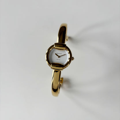 Gucci 1990s Round Dial Gold Plated Bangle Watch