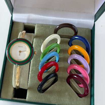 Gucci 1990s Interchangeable Bezel Gold Plated Bangle Watch with 12 bezels, case