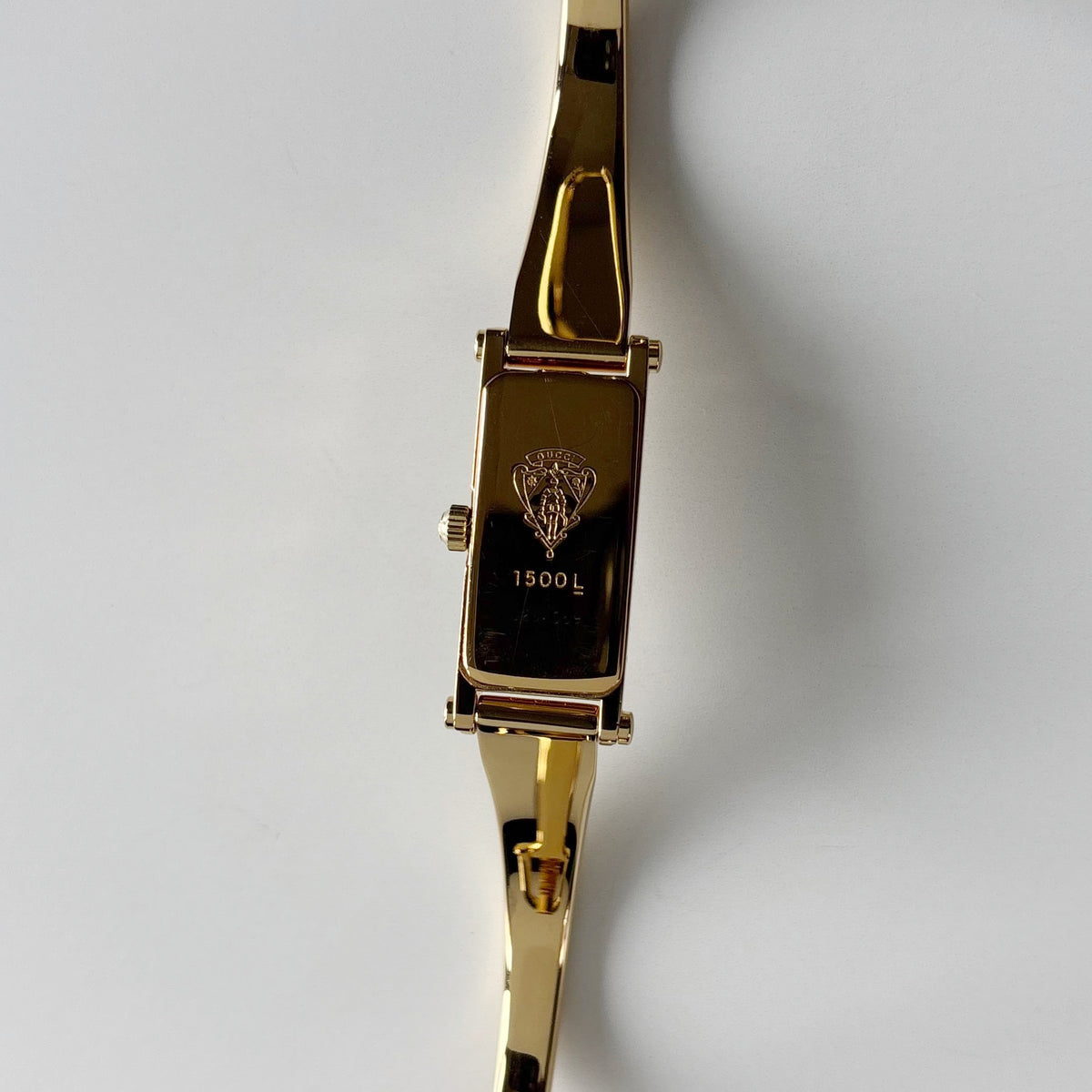 Gucci 1990s Gold Rectangular Dial Gold Plated Bangle Watch
