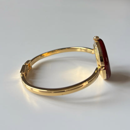 Gucci 1990s Interchangeable Bezel Gold Plated Bangle Watch with 12 bezels, case