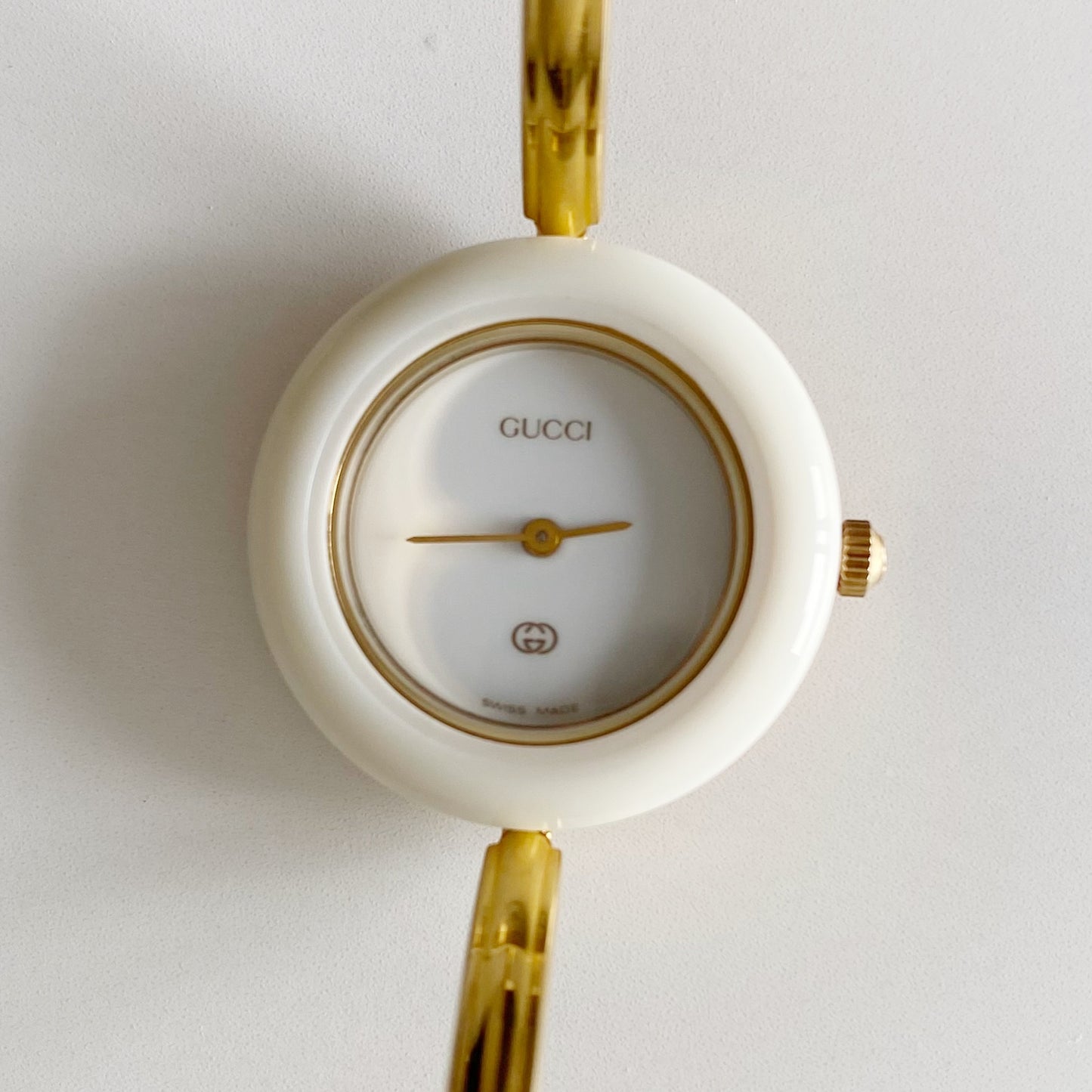 Gucci 1990s Interchangeable Bezel Gold Plated Bangle Watch with 12 bezels, case