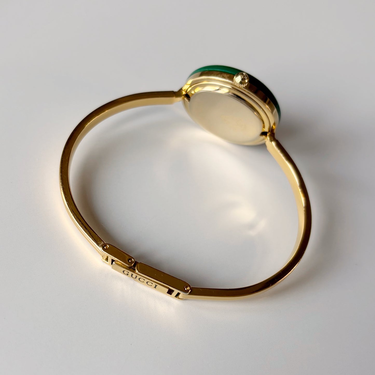 Gucci 1990s Interchangeable Bezel Gold Plated Bangle Watch with 12 bezels, case