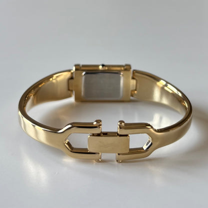 Yves Saint Laurent 1990s Peek a boo Gold Plated Bangle Watch