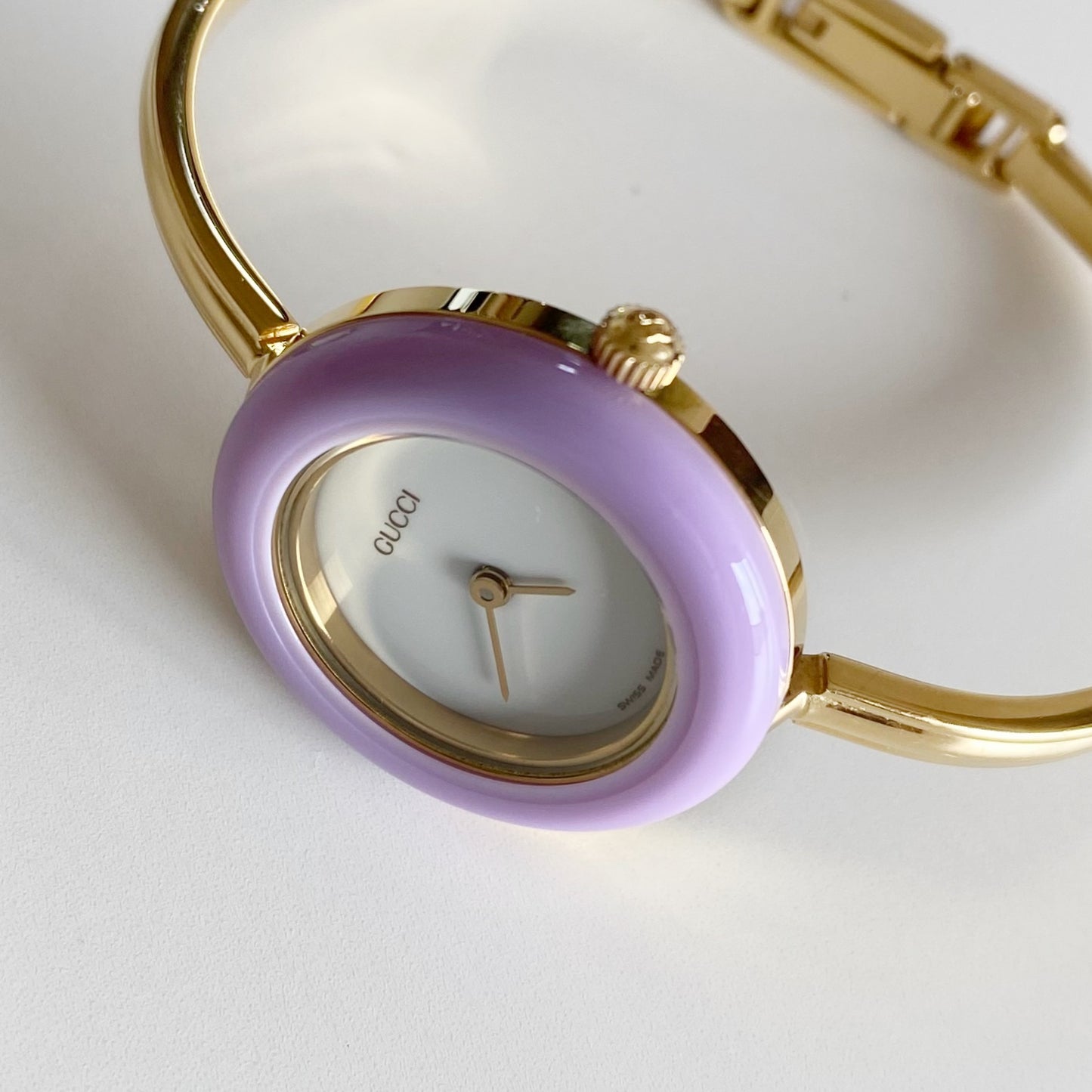 Gucci 1990s Interchangeable Bezel Gold Plated Bangle Watch with 12 bezels, case