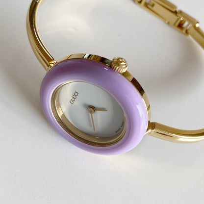 Gucci 1990s Interchangeable Bezel Gold Plated Bangle Watch with 12 bezels, case