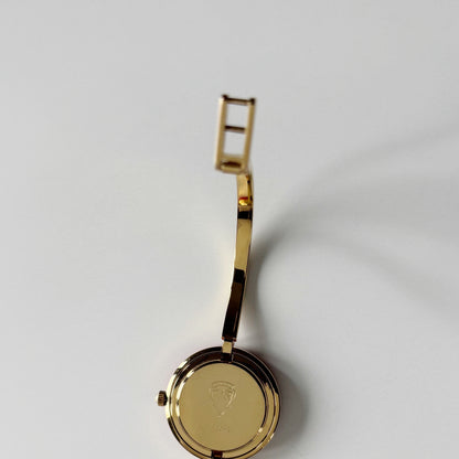 Gucci 1990s Interchangeable Bezel Gold Plated Bangle Watch with 12 bezels, case