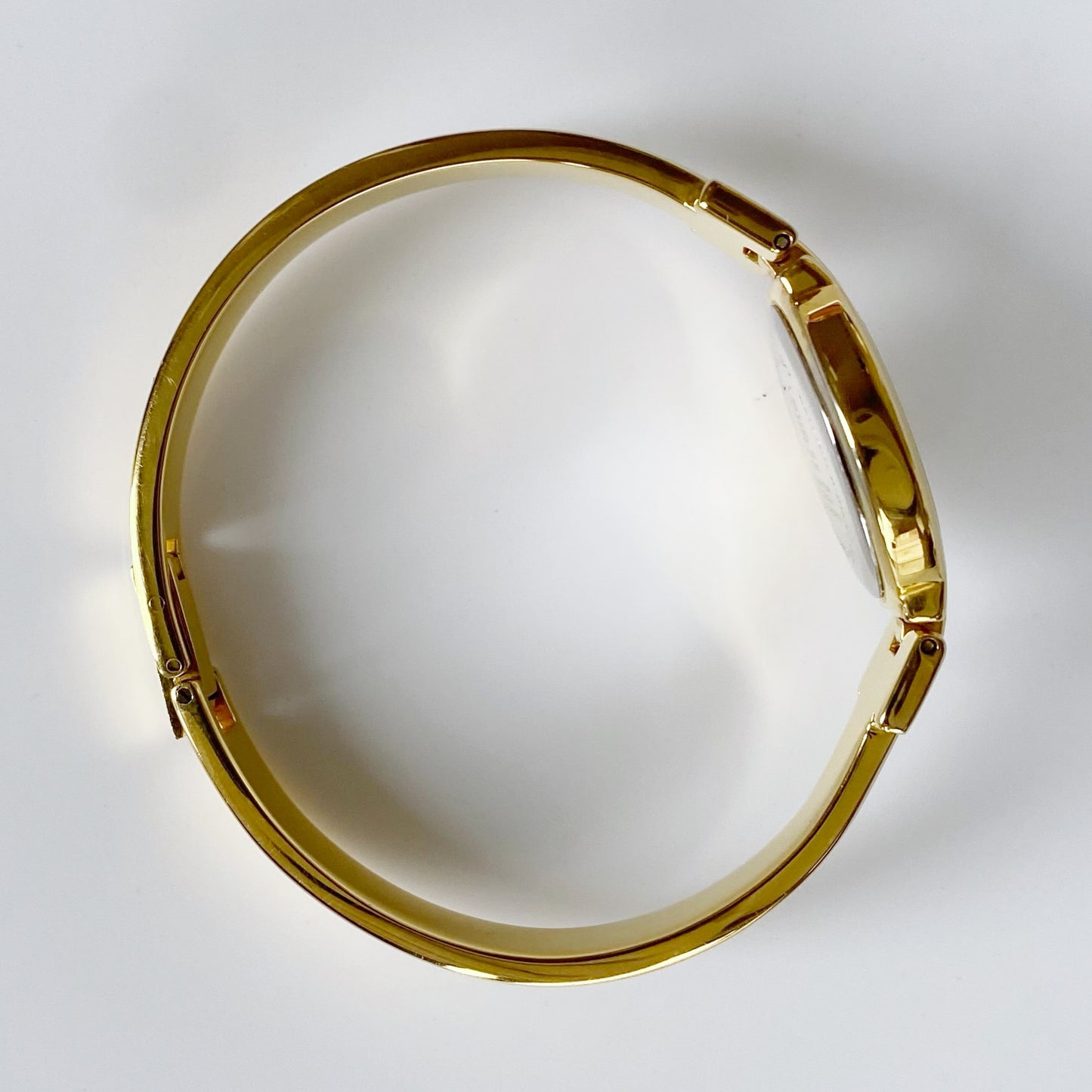 Givenchy 1990s Gold Plated Round Bangle Watch