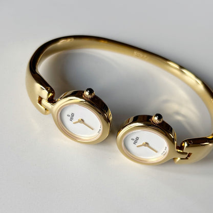 Fendi 1990s Seashell Dial Two Time Zone Gold Plated Bangle Watch