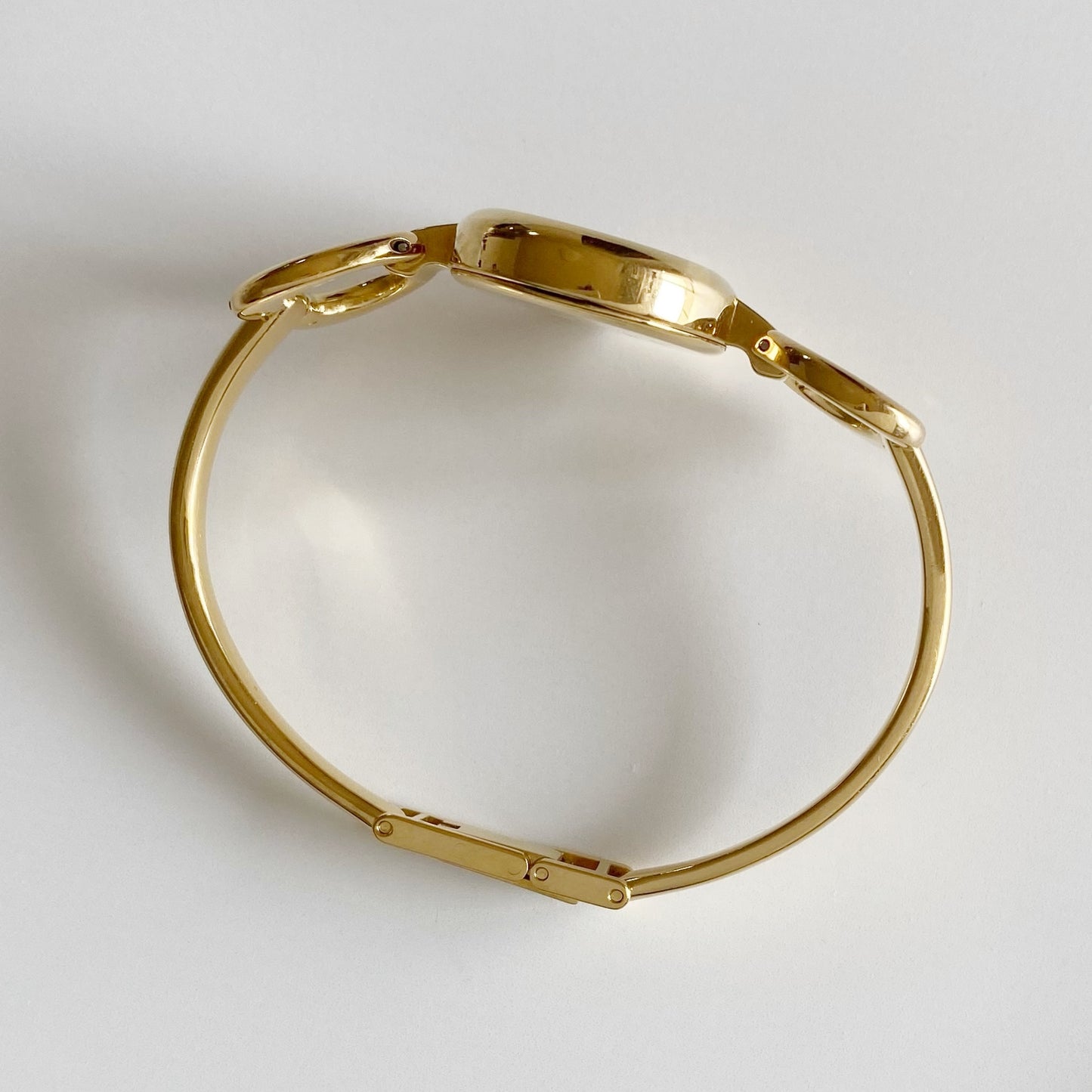 Gucci 1990s Black Dial Gold Plated Bangle Watch