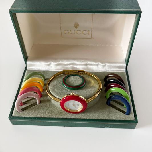 Gucci 1990s Interchangeable Bezel Gold Plated Bangle Watch with 12 bezels, case