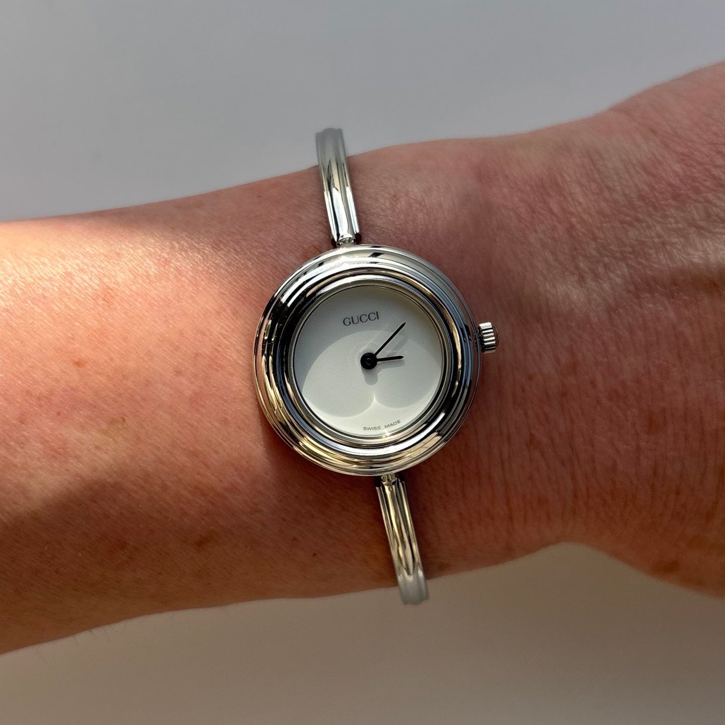 Gucci 1990s Interchangeable Bezel Stainless steel Bangle Watch with 12 bezels, case (Small)