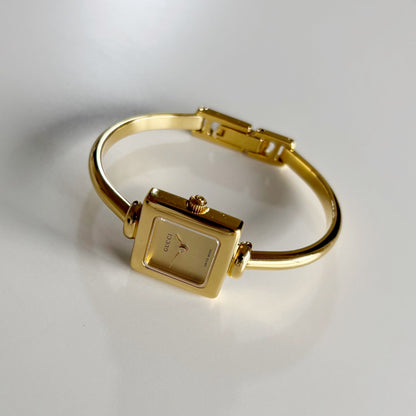 Gucci 1990s Square Dial Gold Plated Bangle Watch (Small)