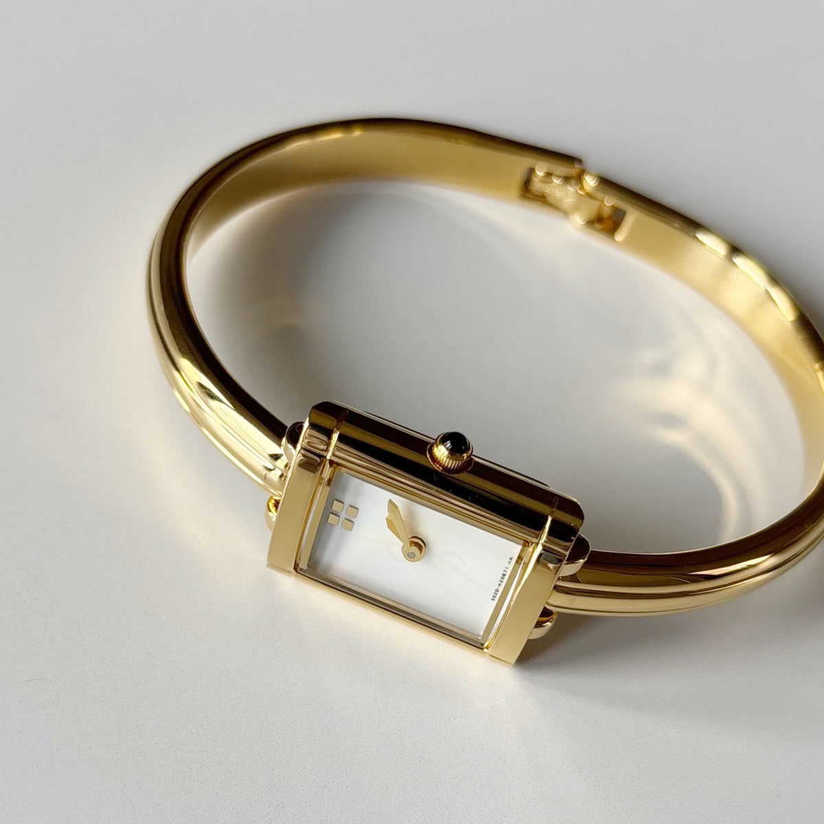 Yves Saint Laurent 1990s Seashell Dial Gold Plated Bangle Watch