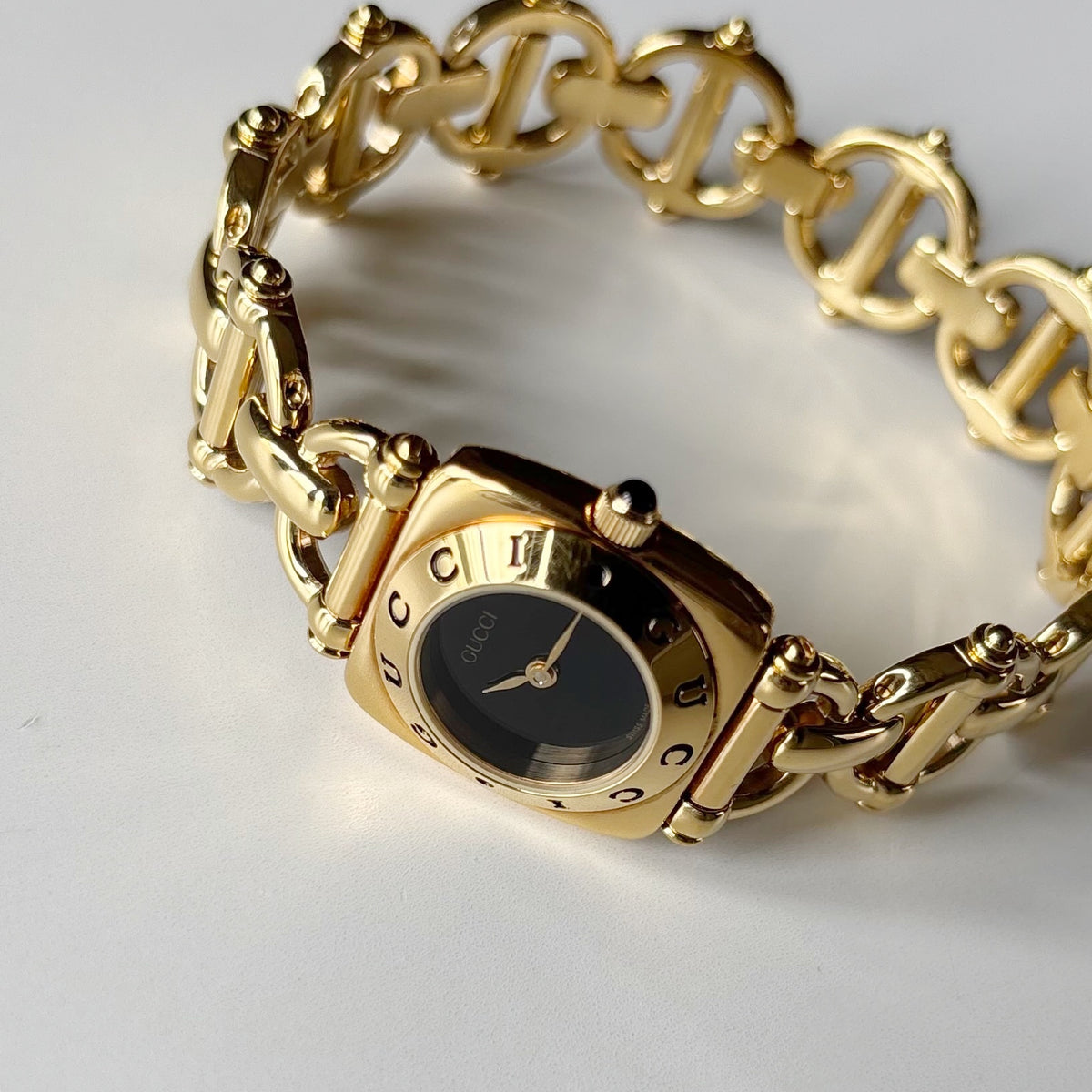 Gucci 1990s Black Dial Gold Plated Horsebit Watch