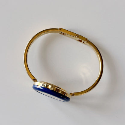 Gucci 1990s Interchangeable Bezel Gold Plated Bangle Watch with 12 bezels, case (Small)