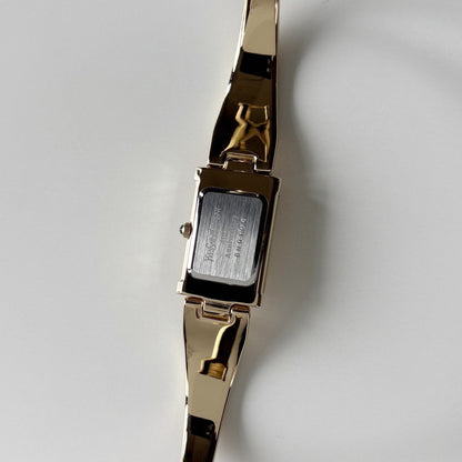 Yves Saint Laurent 1990s Peek-A-Boo Gold Plated Bangle Watch