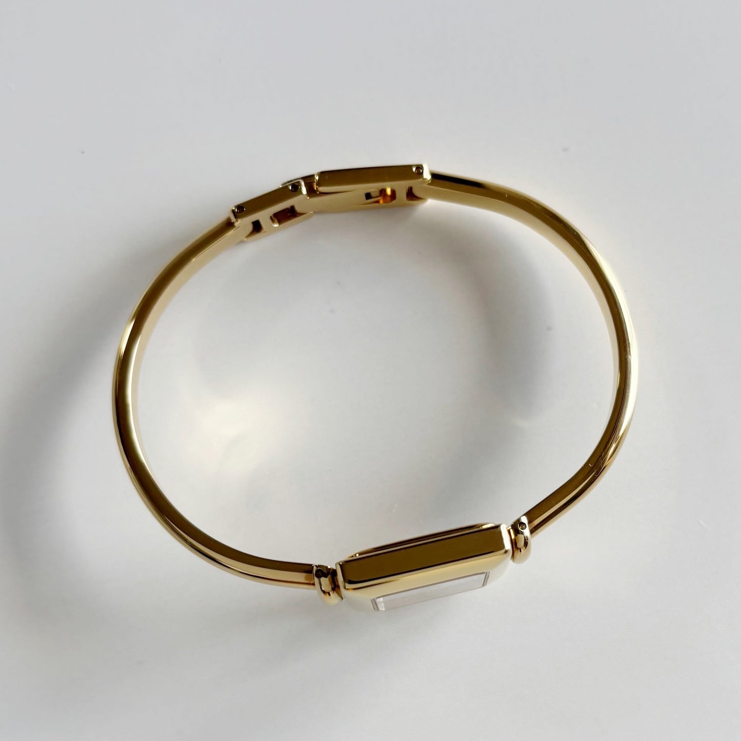 Gucci 1990s Square Dial Gold Plated Bangle Watch