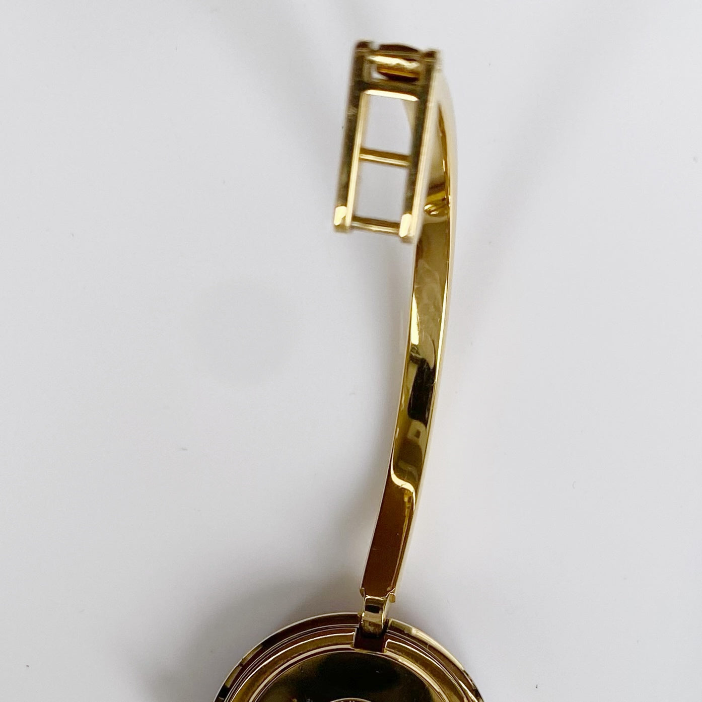 Gucci 1990s Interchangeable Bezel Gold Plated Bangle Watch with 12 bezels, case