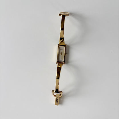 Gucci 1990s Seashell Rectangular Dial Gold Plated Bangle Watch