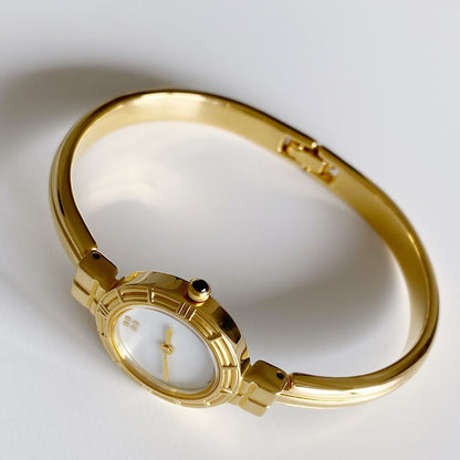Yves Saint Laurent Seashell Dial Gold Plated Bangle Watch