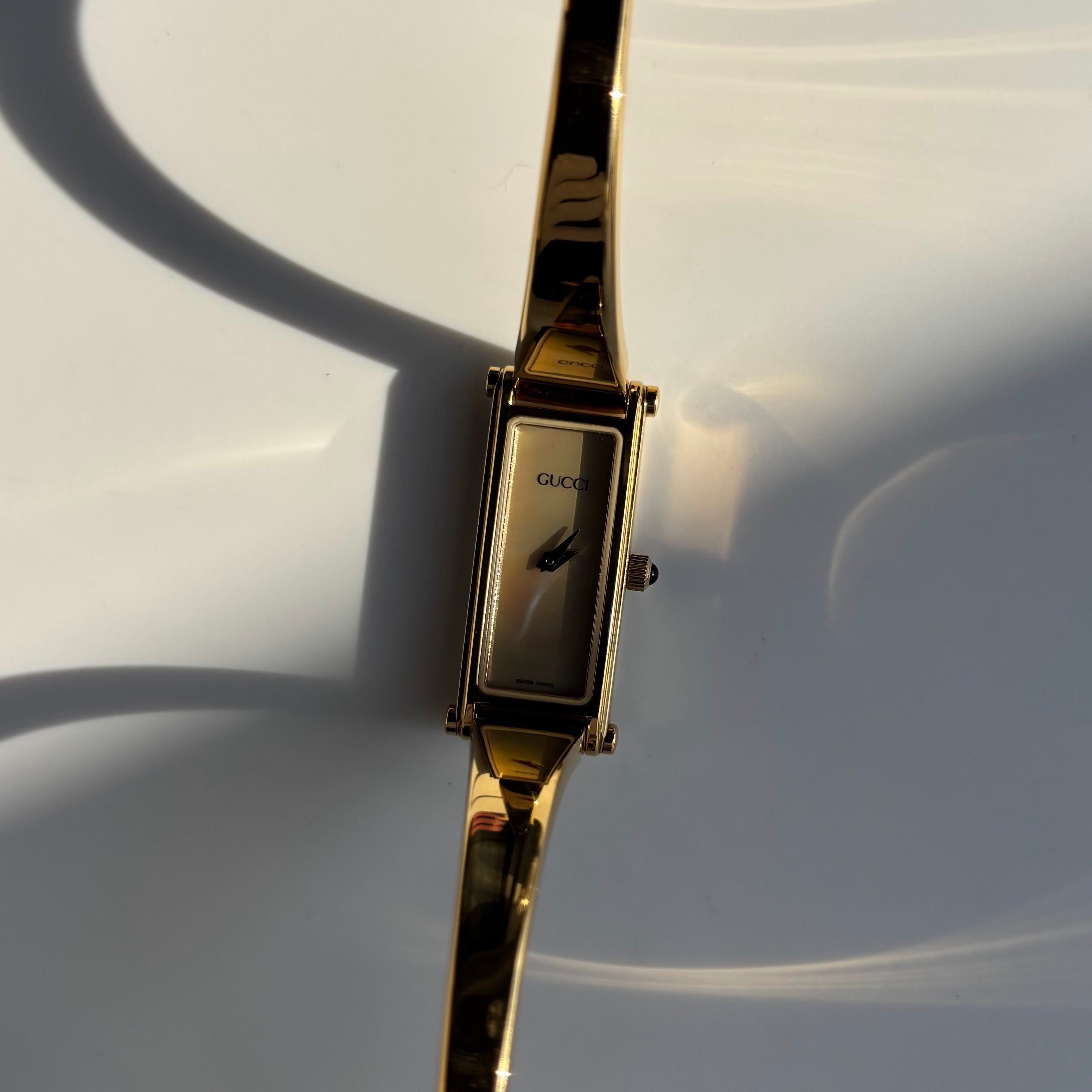 Gucci 1990s Seashell Dial Rectangular Gold Plated Bangle Watch