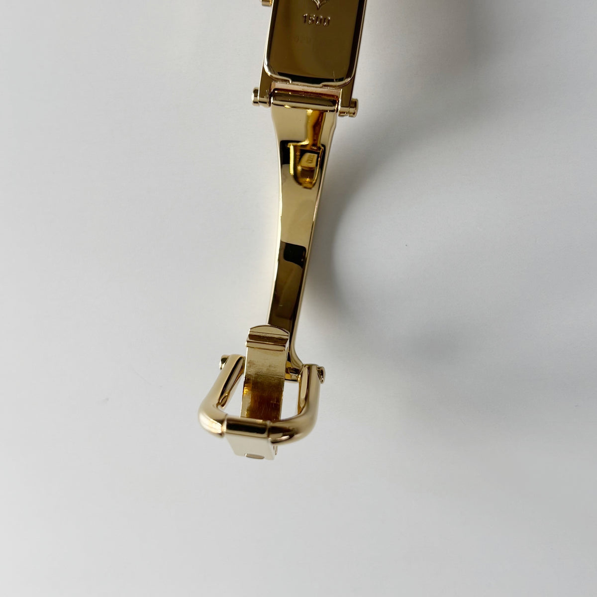 Gucci 1990s Rectangular Gold Dial Gold Plated Bangle Watch (Small)