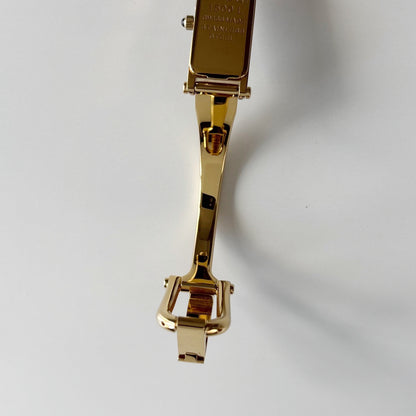 Gucci 1990s Black Rectangular Dial Gold Plated Bangle Watch