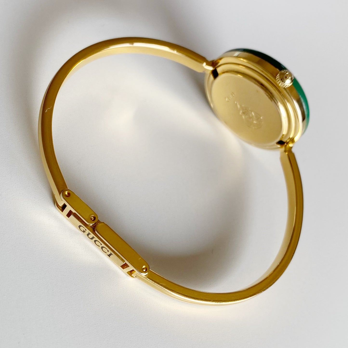 Gucci 1990s Interchangeable Bezel Gold Plated Bangle Watch with 12 bezels, case