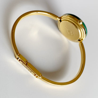 Gucci 1990s Interchangeable Bezel Gold Plated Bangle Watch with 12 bezels, case
