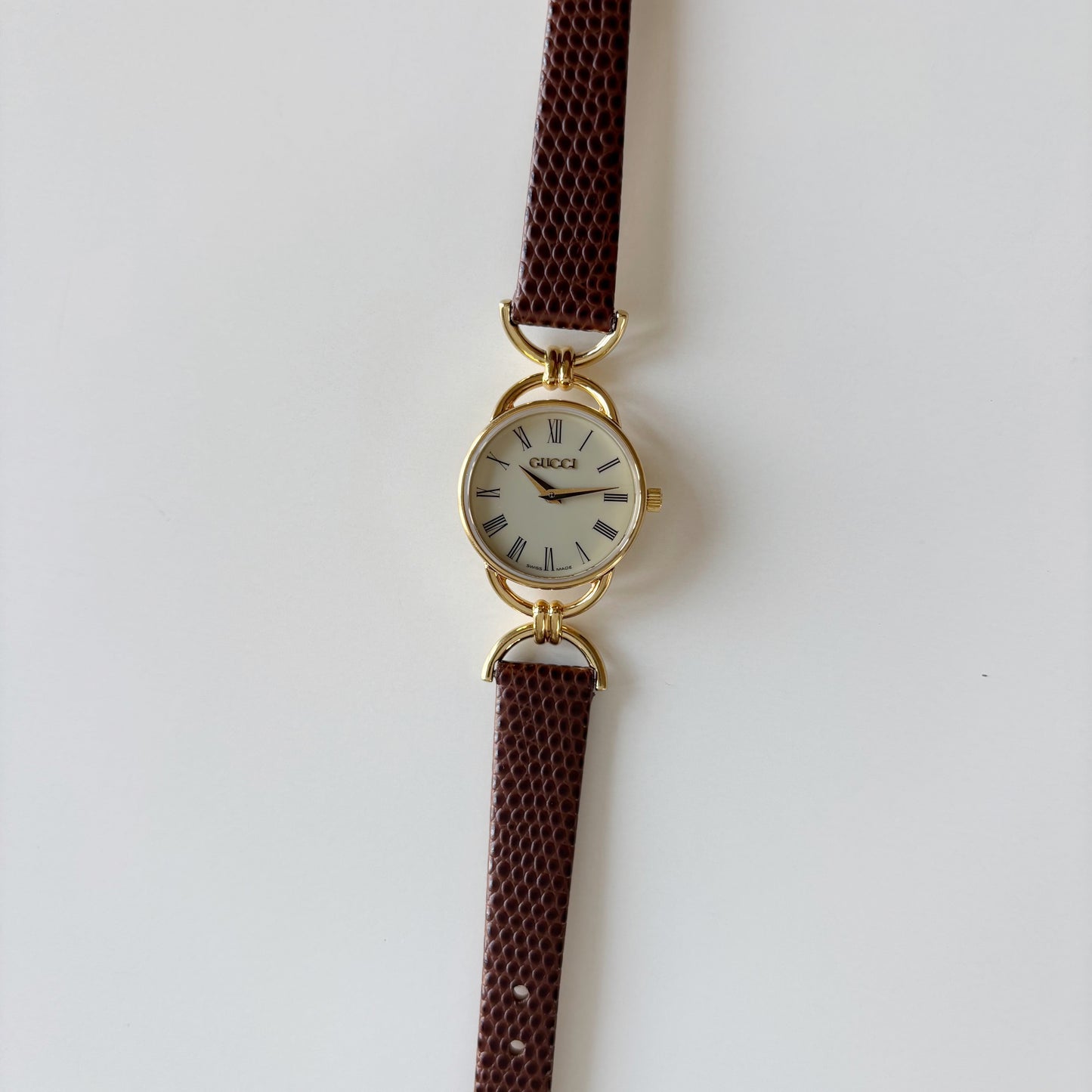 Gucci 1990s Round Cream Dial Horsebit Gold Plated Watch