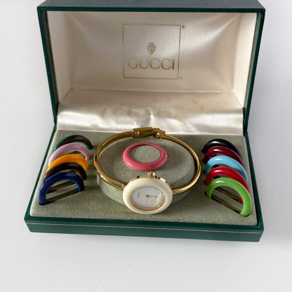 Gucci 1990s Interchangeable Bezel Gold Plated Bangle Watch with 12 bezels, case