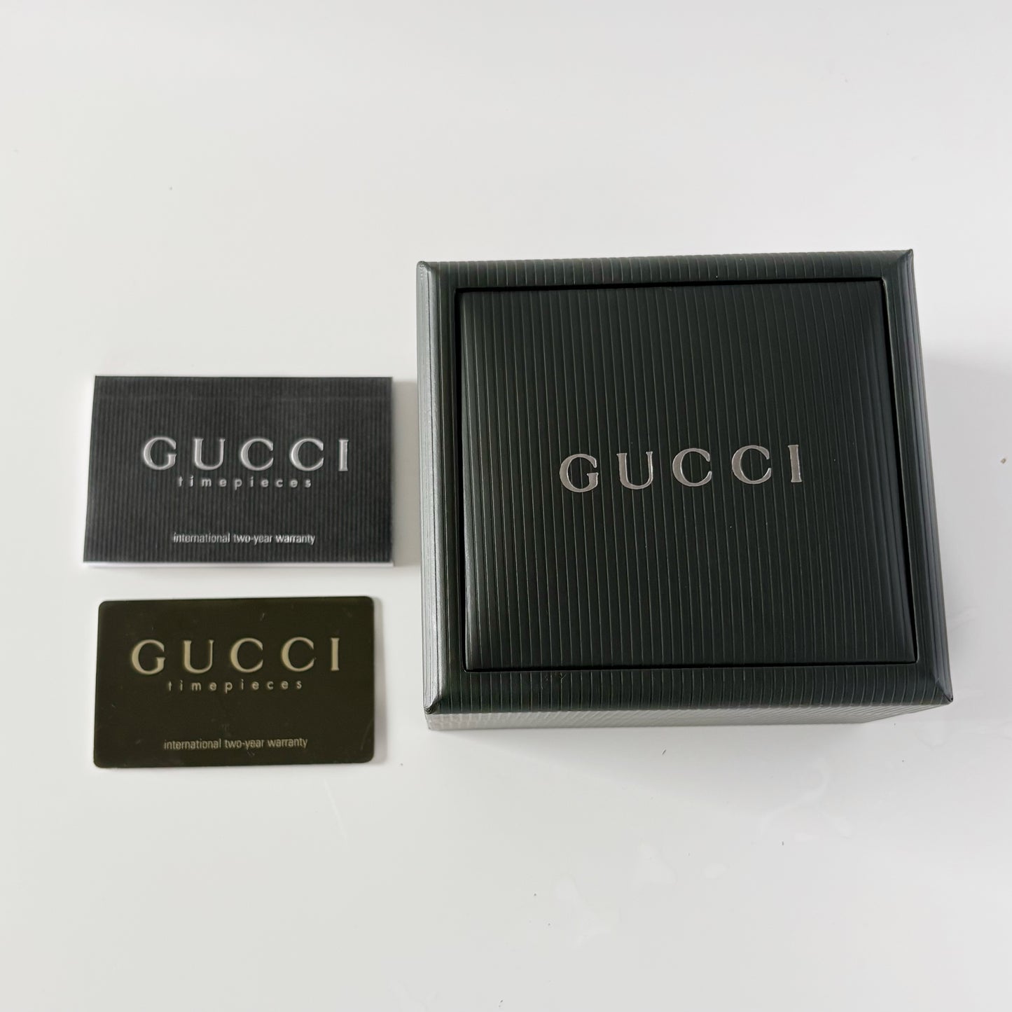 Gucci 1990s Rectangular Gold Dial Gold Plated Bangle Watch