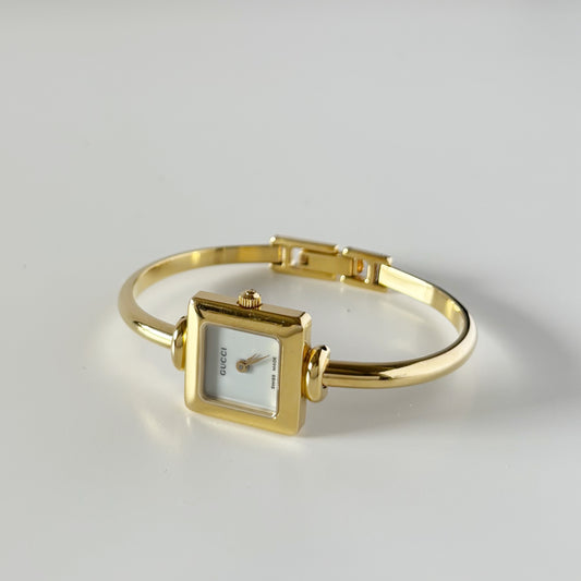 Gucci 1990s Square Dial Gold Plated Bangle Watch