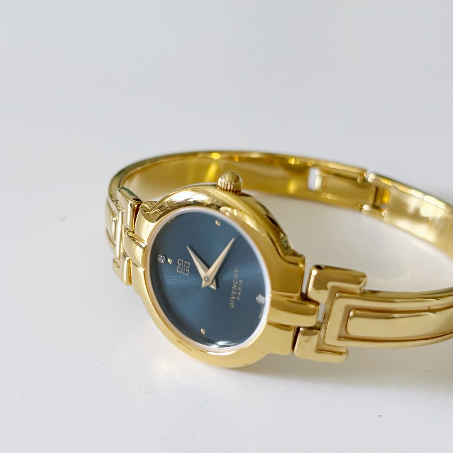 Givenchy 1990s Navy Dial Gold Plated Bangle Watch