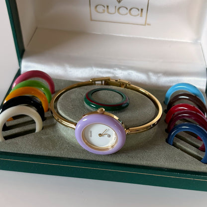 Gucci 1990s Interchangeable Bezel Gold Plated Bangle Watch with 12 bezels, case