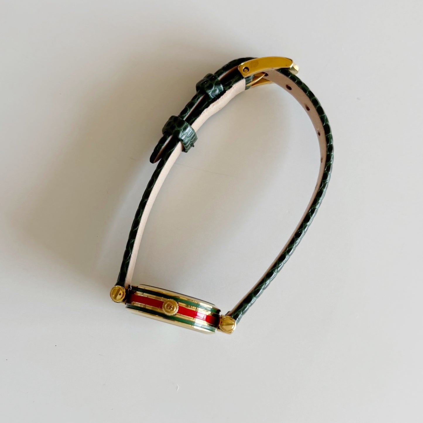 Gucci 1990s Round Dial Green Gold Plated Watch