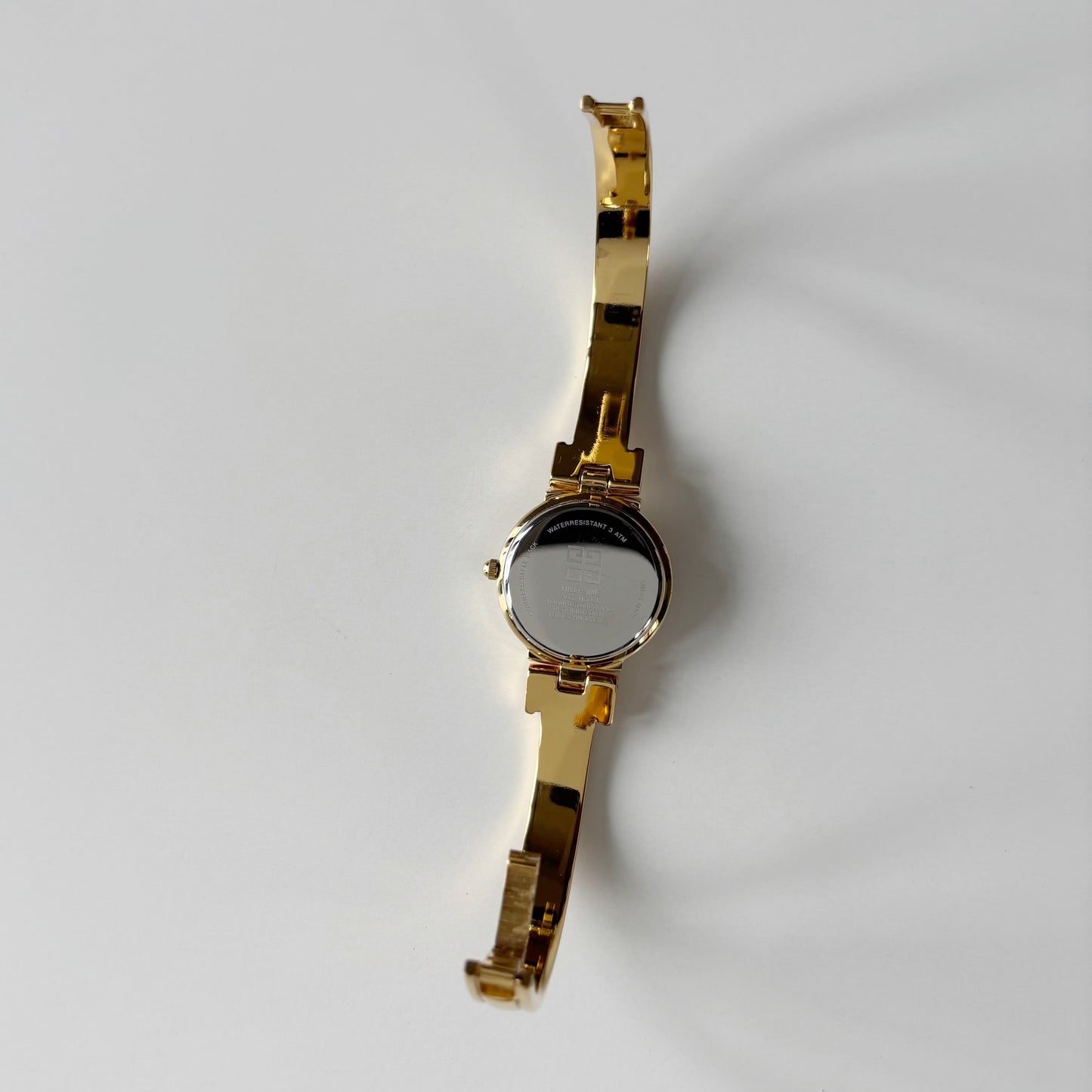 Givenchy 1990s Round Dial Gold Plated Bangle Watch