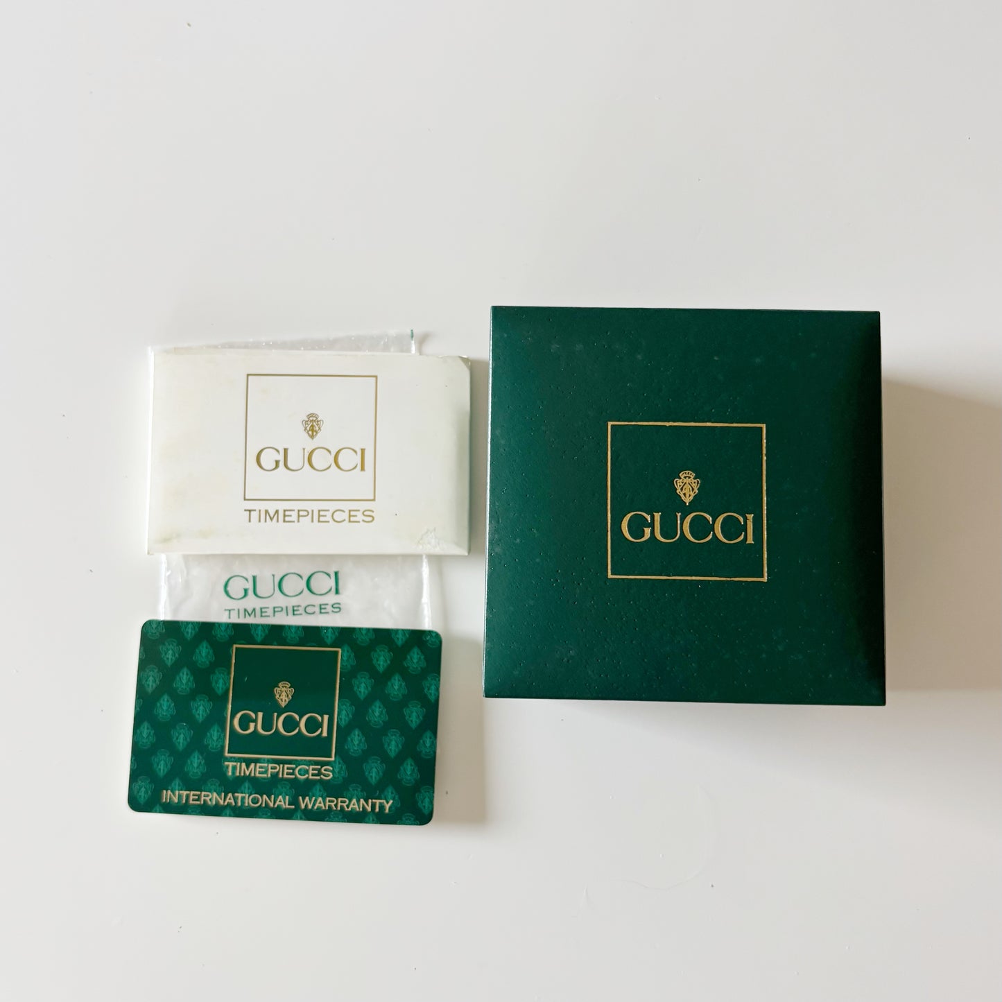 Gucci 1990s Interchangeable Bezel Gold Plated Bangle Watch with 12 bezels, case