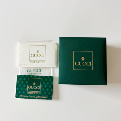 Gucci 1990s Interchangeable Bezel Gold Plated Bangle Watch with 12 bezels, case
