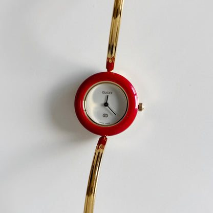 Gucci 1990s Interchangeable Bezel Gold Plated Bangle Watch with 12 bezels, case
