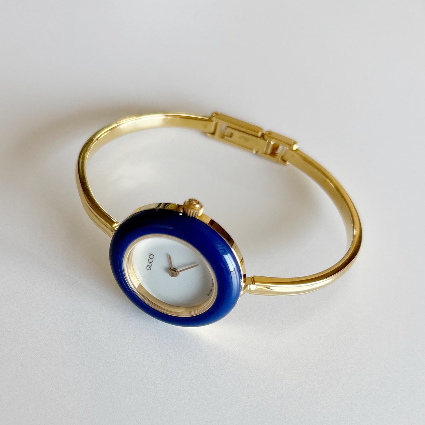 Gucci 1990s Interchangeable Bezel Gold Plated Bangle Watch with 12 bezels, case