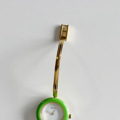 Gucci 1990sInterchangeable Bezel Gold Plated Bangle Watch with 12 bezels, case