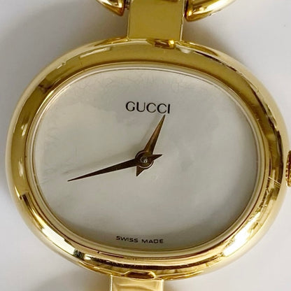 Gucci 1990s Seashell Dial Oval Gold Plated Bangle Watch