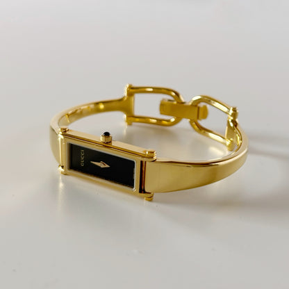 Gucci 1990s Black Dial Gold Plated Bangle Watch