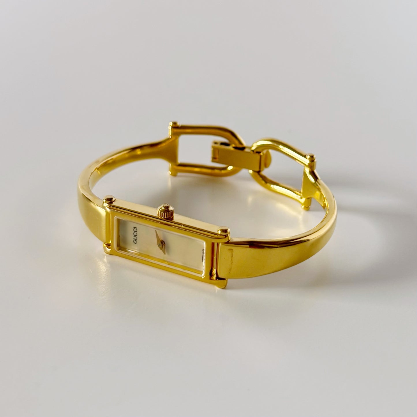 Gucci 1990s Rectangular Seashell Dial Gold Plated Bangle Watch